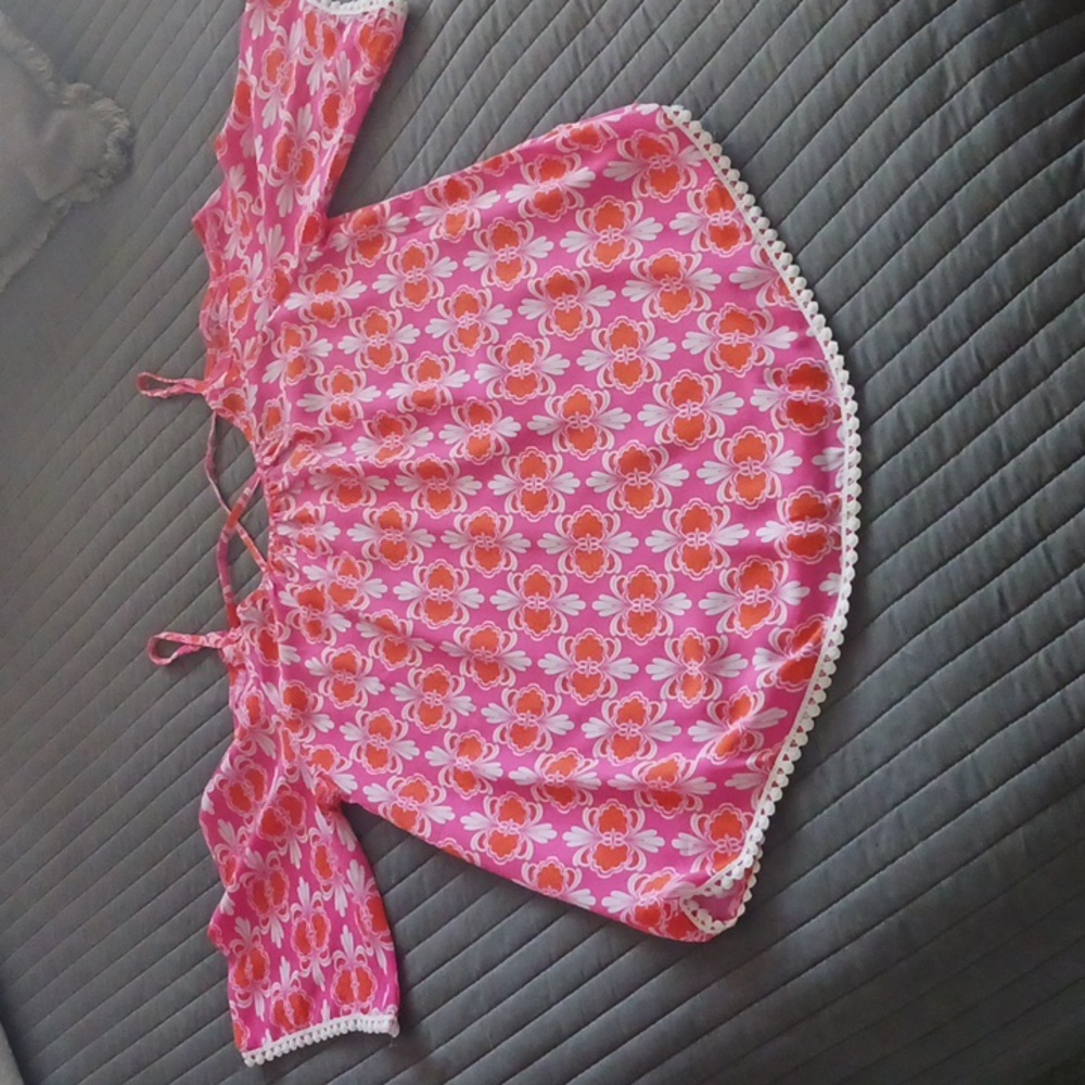 Charming Charlie Pink and Orange Boho Print Top with pom pom trim.